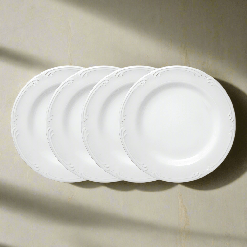Elegant stoneware salad plate set of 4 displayed on a dining table.