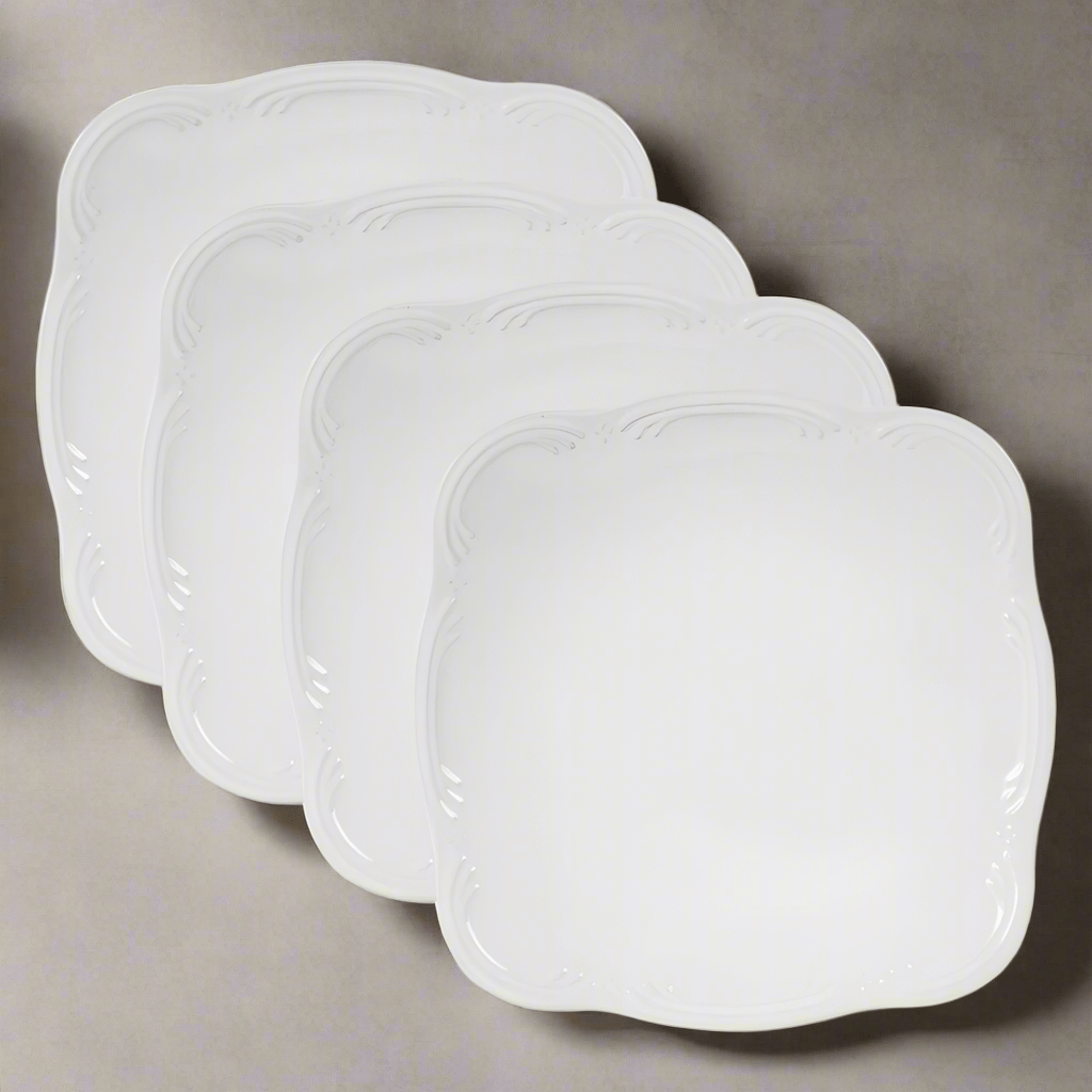 Close-up of square stoneware dinner plates with a subtle pattern, ideal for stylish dinner plates for sale