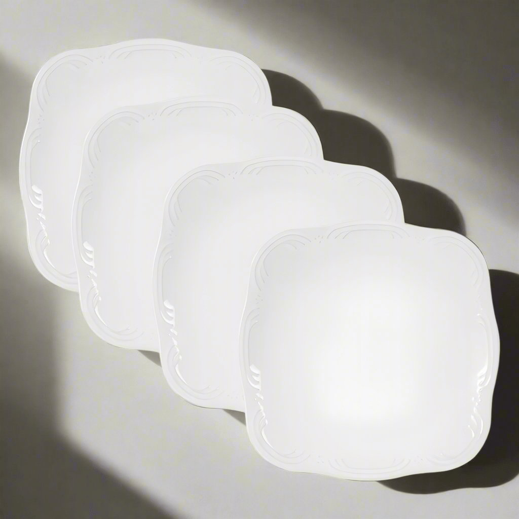 Elegant square salad plates set displayed on a dining table, showcasing their stylish design.