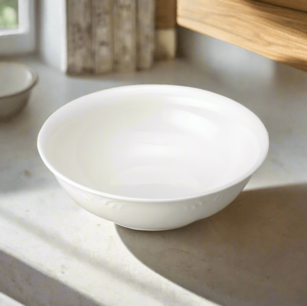 Elegant stoneware vegetable serving bowl from above, showcasing its smooth finish.
