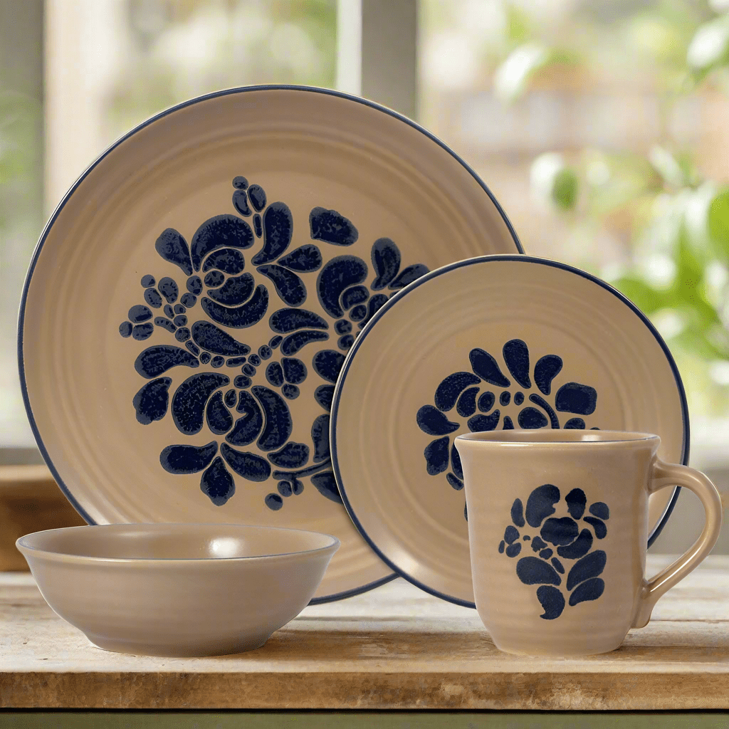 Overhead view of the Folkstone stoneware dinnerware set arranged on a rustic wooden table