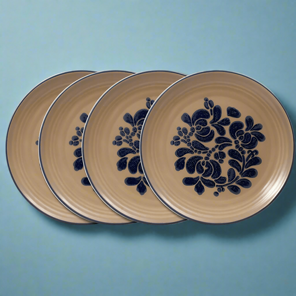Close-up of folk art handmade stoneware dinner plate with intricate designs