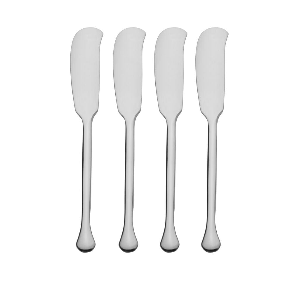 Elegant Geneva cheese spreaders set on a beautifully arranged dining table.