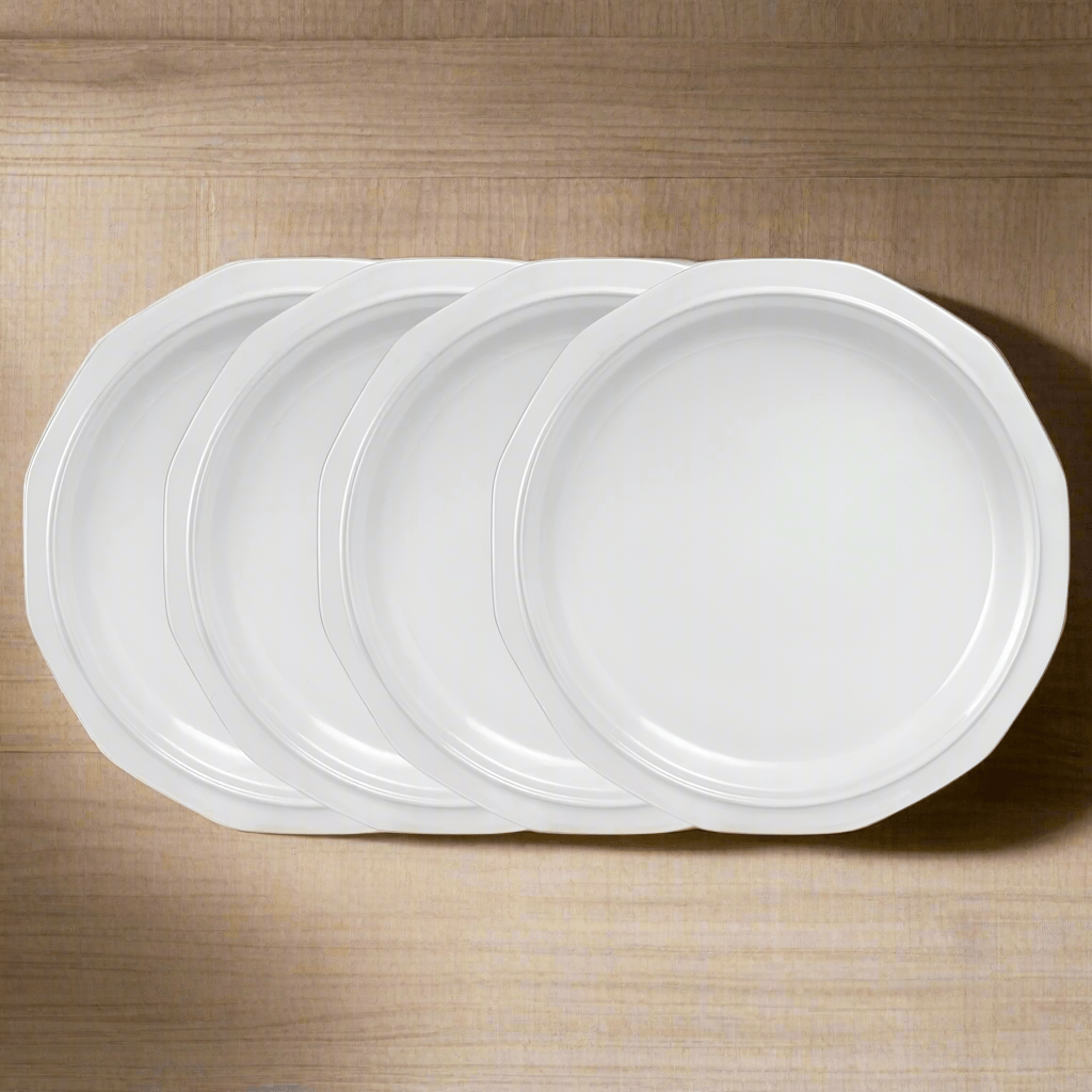 Close-up of ceramic dinner plates showing their glossy finish and 10-inch size