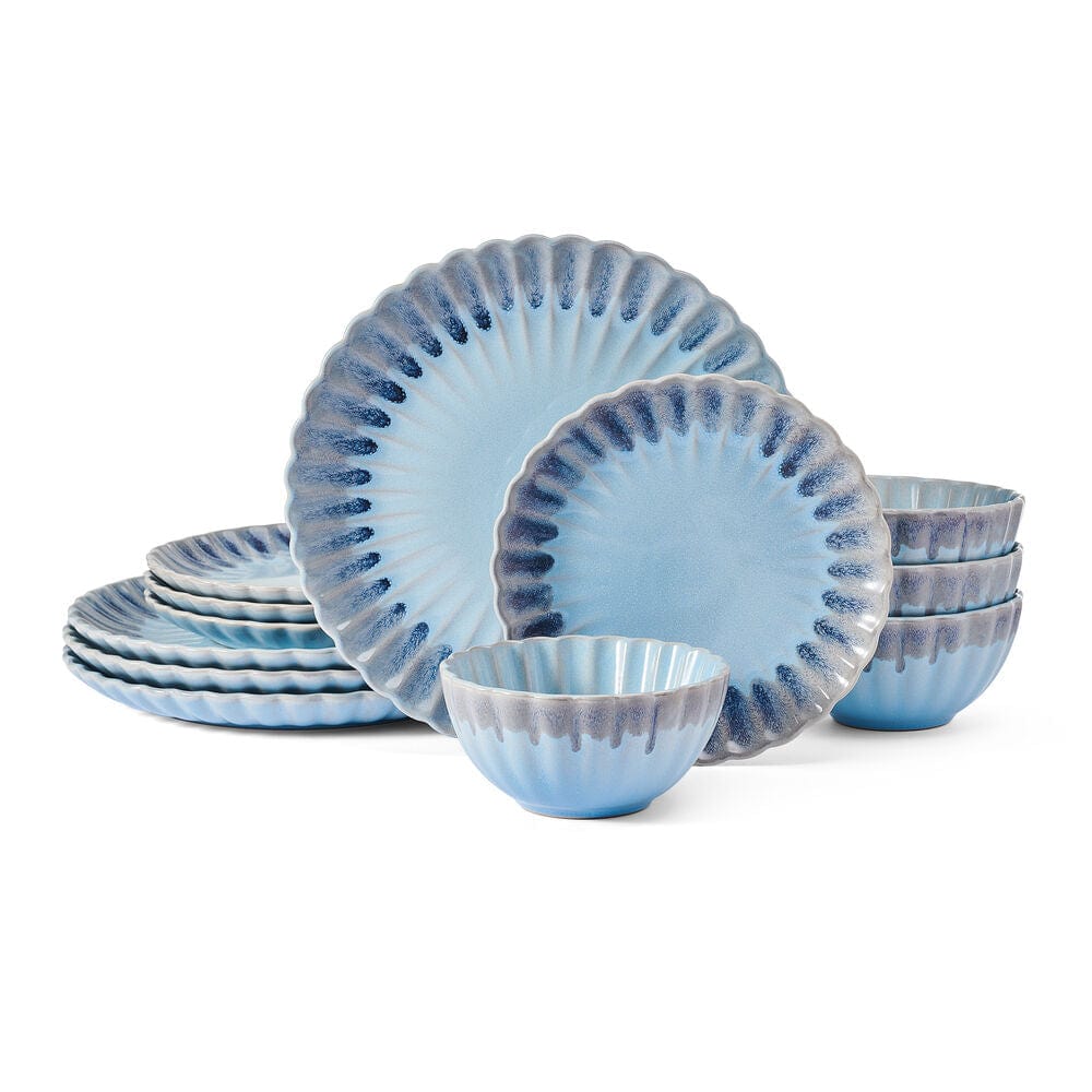 Set of four dinnerware pieces arranged on a dining table for entertaining