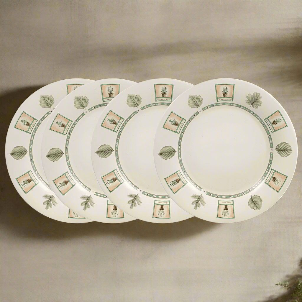 Set of 4 oversized stoneware dinner plates on a dining table, showcasing their elegant design.