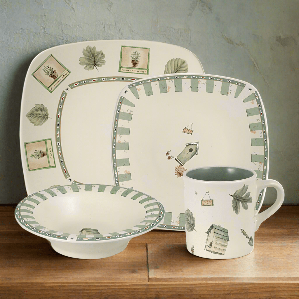 Square dinnerware set featuring plates, bowls, and mugs for modern tables