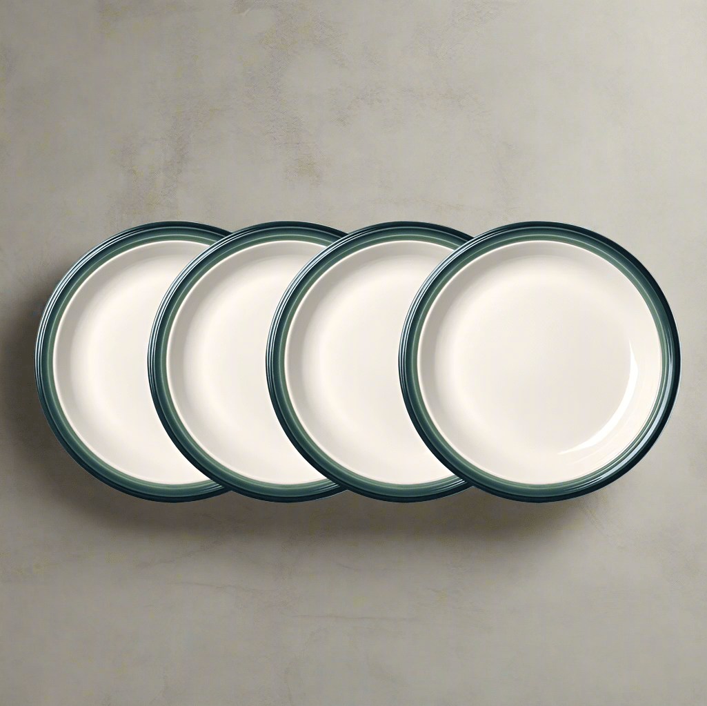 Close-up of 10 inch stoneware dinner plates stacked, showcasing their elegant design.