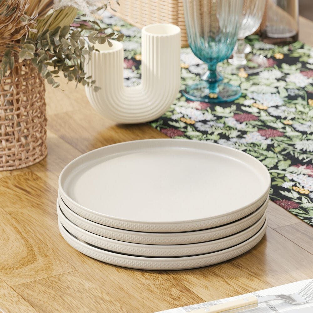 Close-up of embossed dot border on white dinner plate