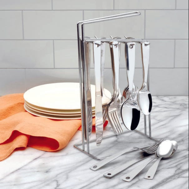 Piccadilly flatware set with caddy on a dining table, showcasing its stylish design