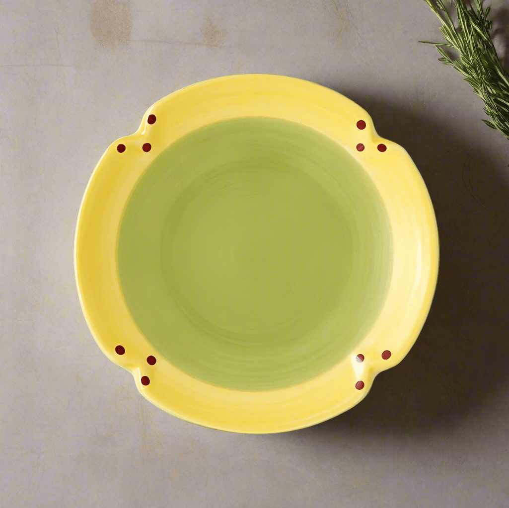Close-up of a stoneware dessert plate with intricate detailing, perfect for tea time