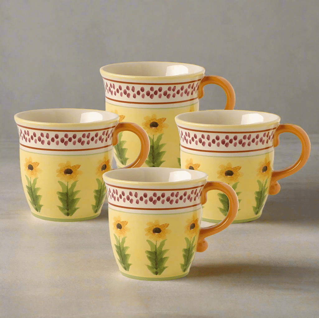 Side view of Pistoulet stoneware mugs showcasing rustic glaze and large coffee cup shape