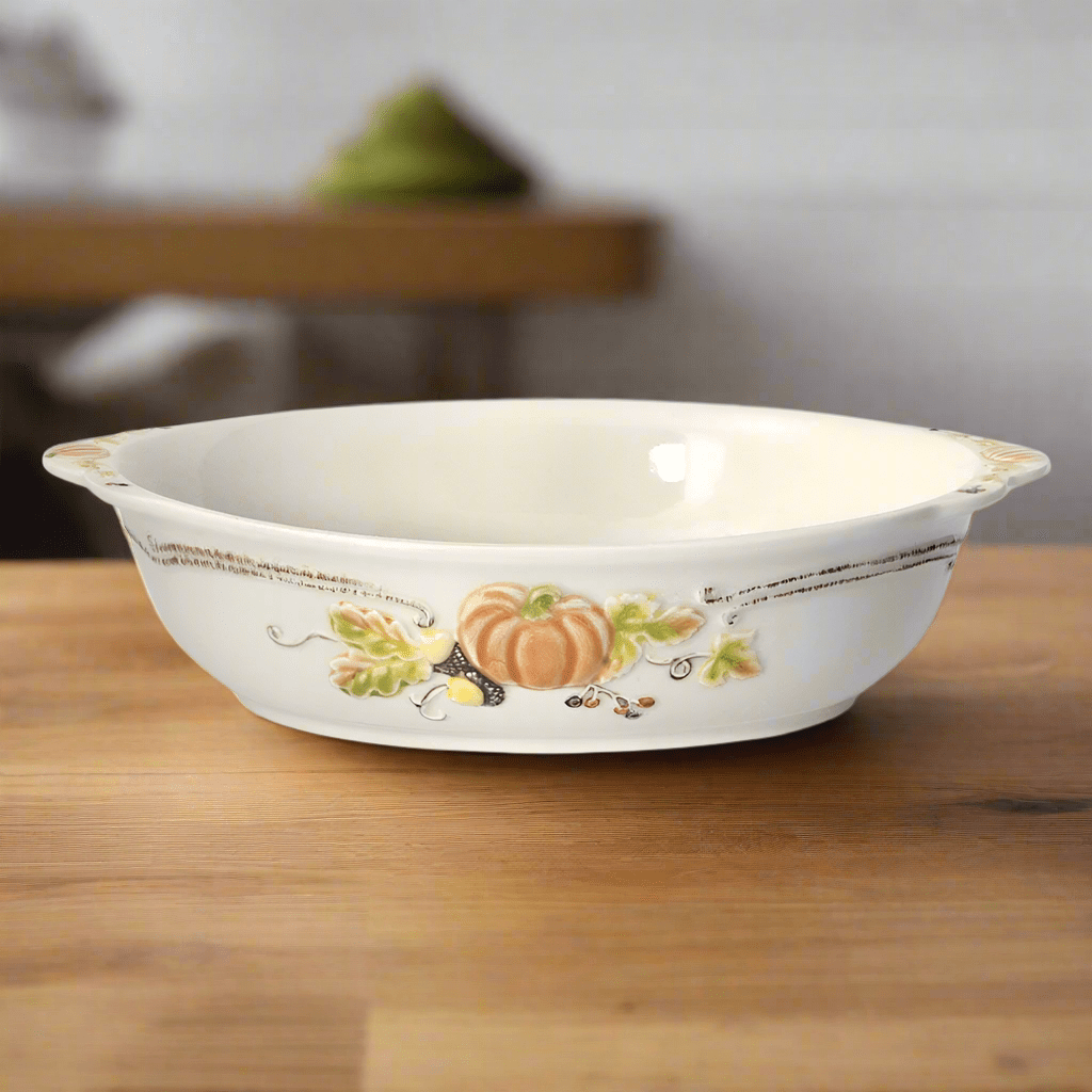 Elegant stoneware oval serve bowl showcasing food at a party.