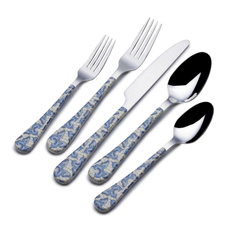 Close-up of shiny silverware with butterfly design, perfect for everyday use