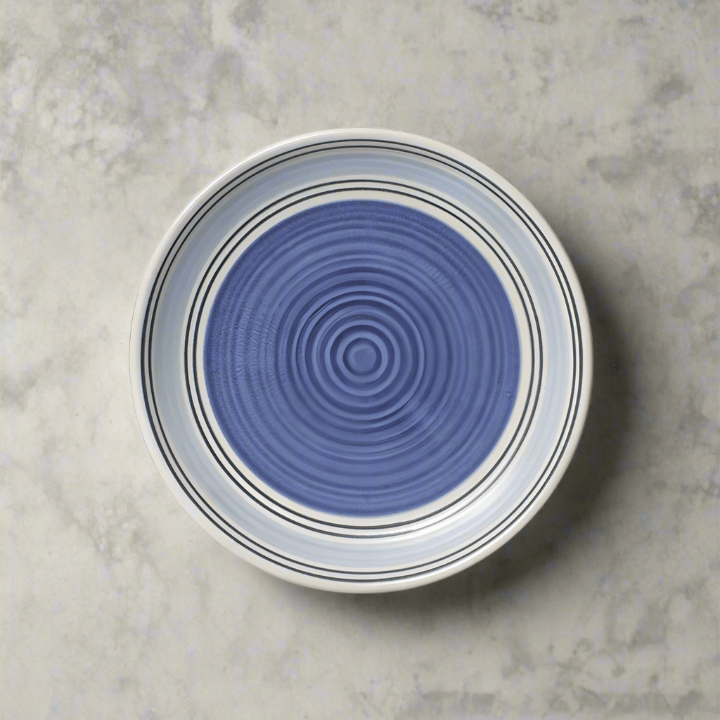 Set of Rio stoneware dessert plates on a dinner table for home use