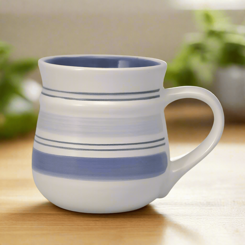 Close-up of the Rio stoneware coffee mug showing its textured finish and capacity