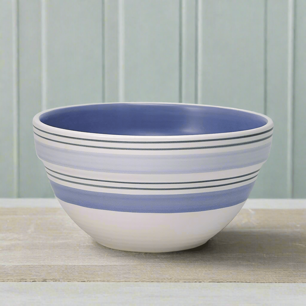 Versatile stoneware bowl filled with cereal and fresh fruits, showcasing its perfect size for breakfast.