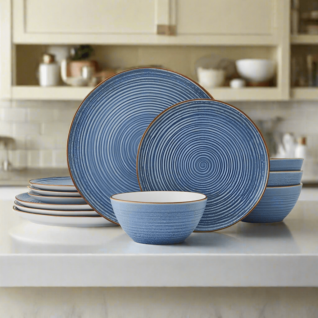 Rowan Blue dinner plates featuring concentric circles and a warm tan rim from an overhead angle