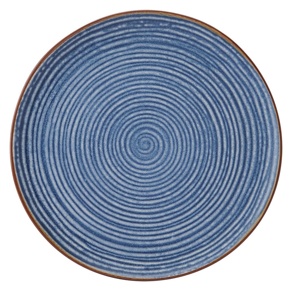 Set of blue stoneware dishes displayed on a dining table, perfect for everyday use