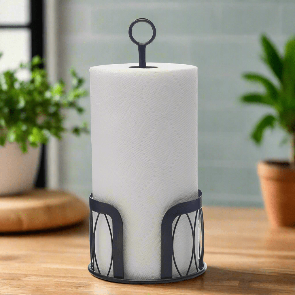 Front angle of the paper towel holder displayed on a farmhouse kitchen counter