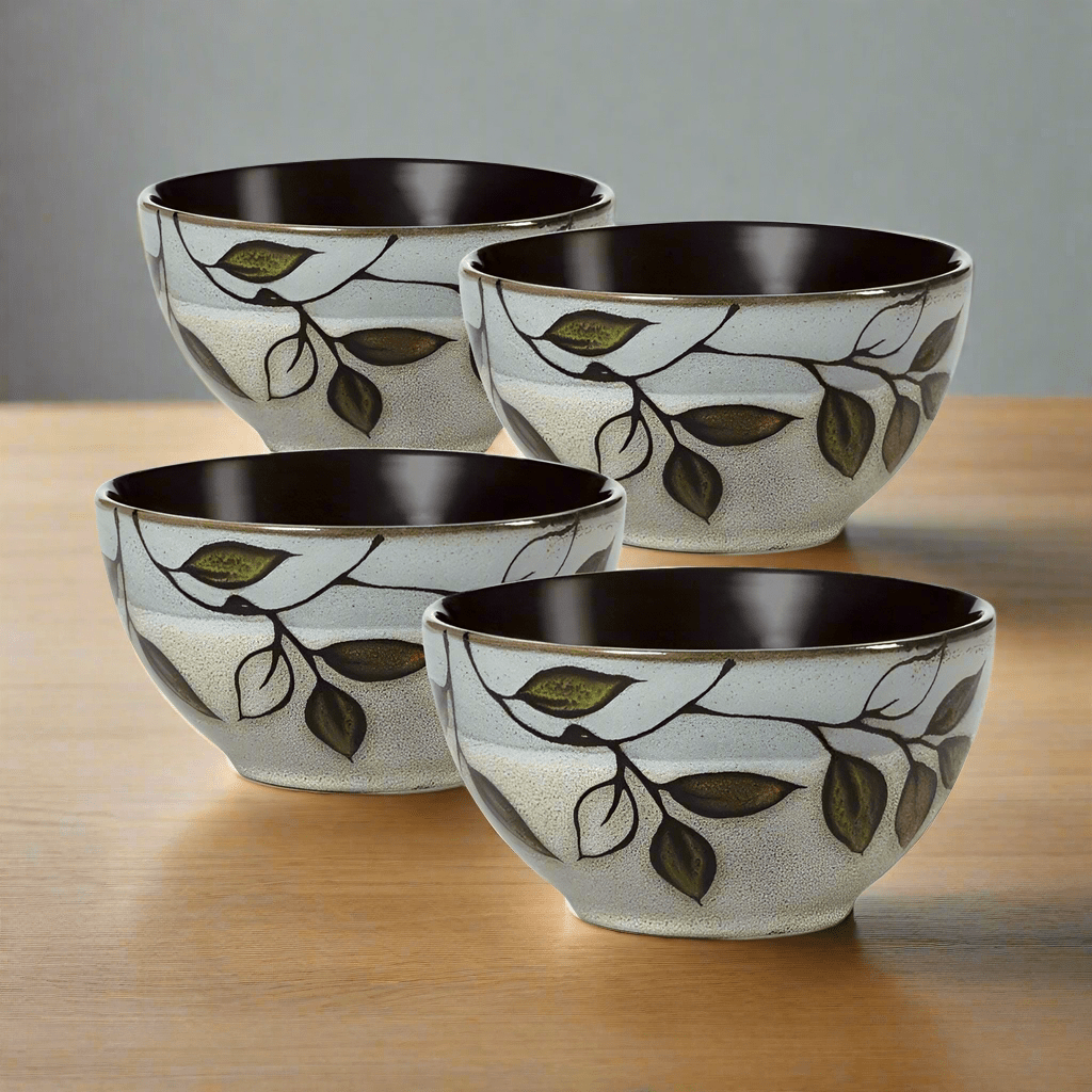Close-up of handcrafted reactive glaze stoneware fruit bowls showing unique color variations
