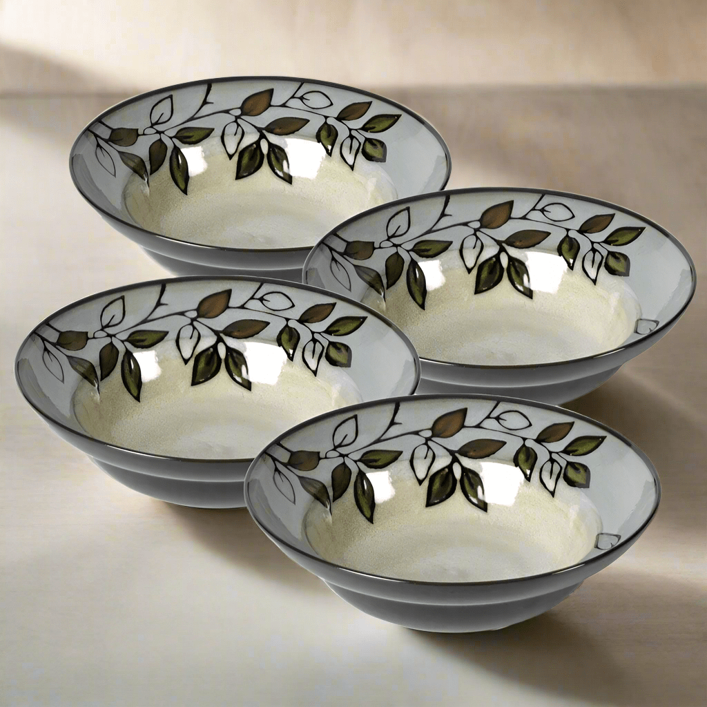 Close-up of rustic leaves stoneware soup bowl with reactive glaze finish