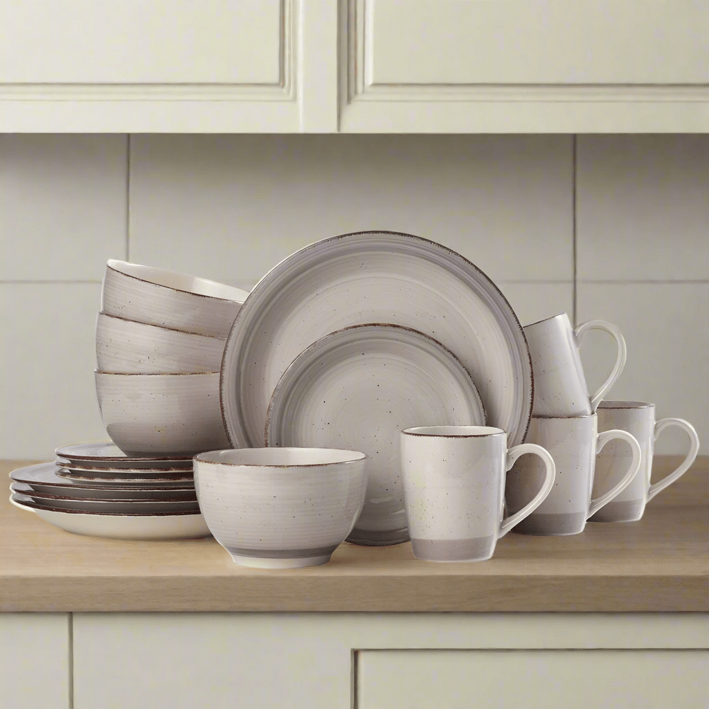 Close-up of Sadie cream dinner plates with a modern, organic shape