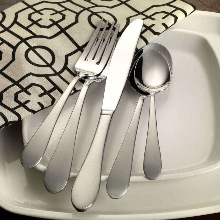 Close-up of Salisbury Satin flatware set on a dinner table