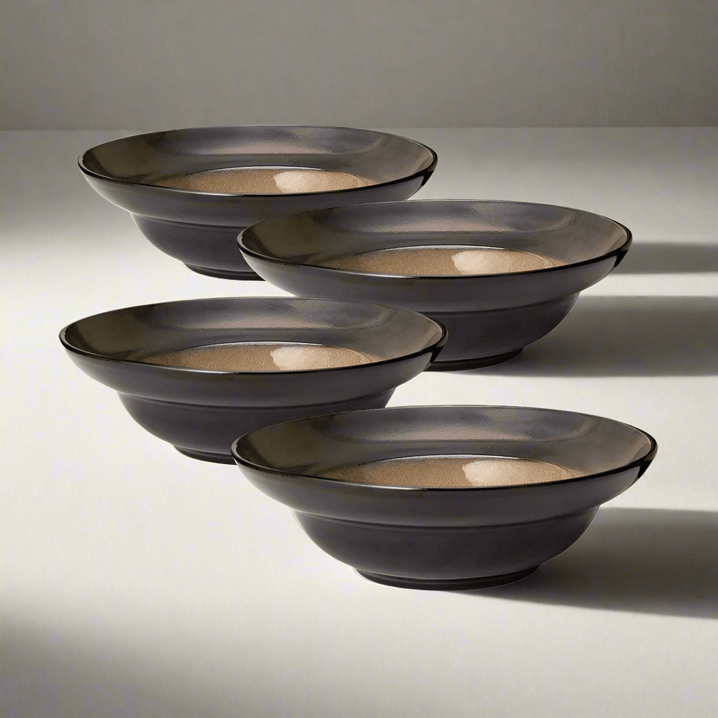 Close-up of handcrafted reactive glaze stoneware bowl showcasing unique color variations