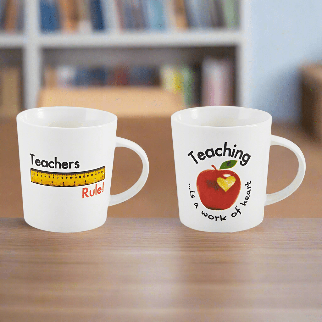 Heartfelt teacher mugs set showcasing 'Teachers Rule' and 'Teaching...is a work of heart' designs.