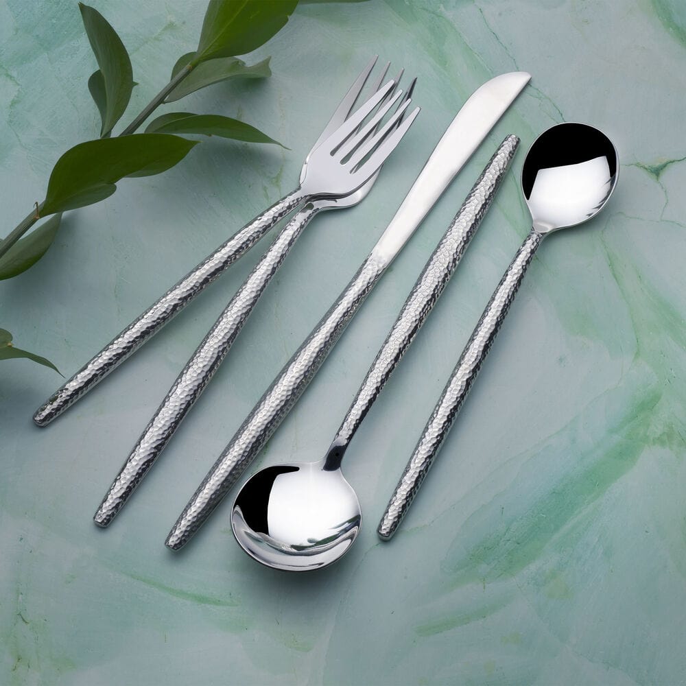 Shea Modern stainless steel flatware set displayed on a dining table, ideal for formal dining.
