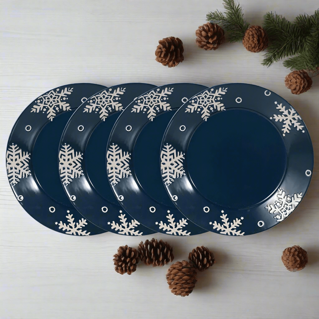 Close-up of blue and white stoneware dinner plate with snowflake pattern, ideal for holiday tables