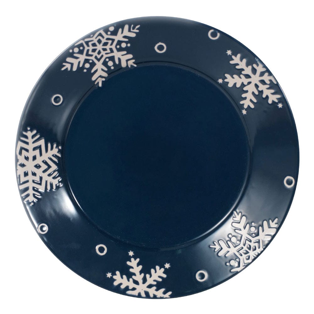 Set of four large 11 inch snowflake dinner plates arranged for festive dinner setting