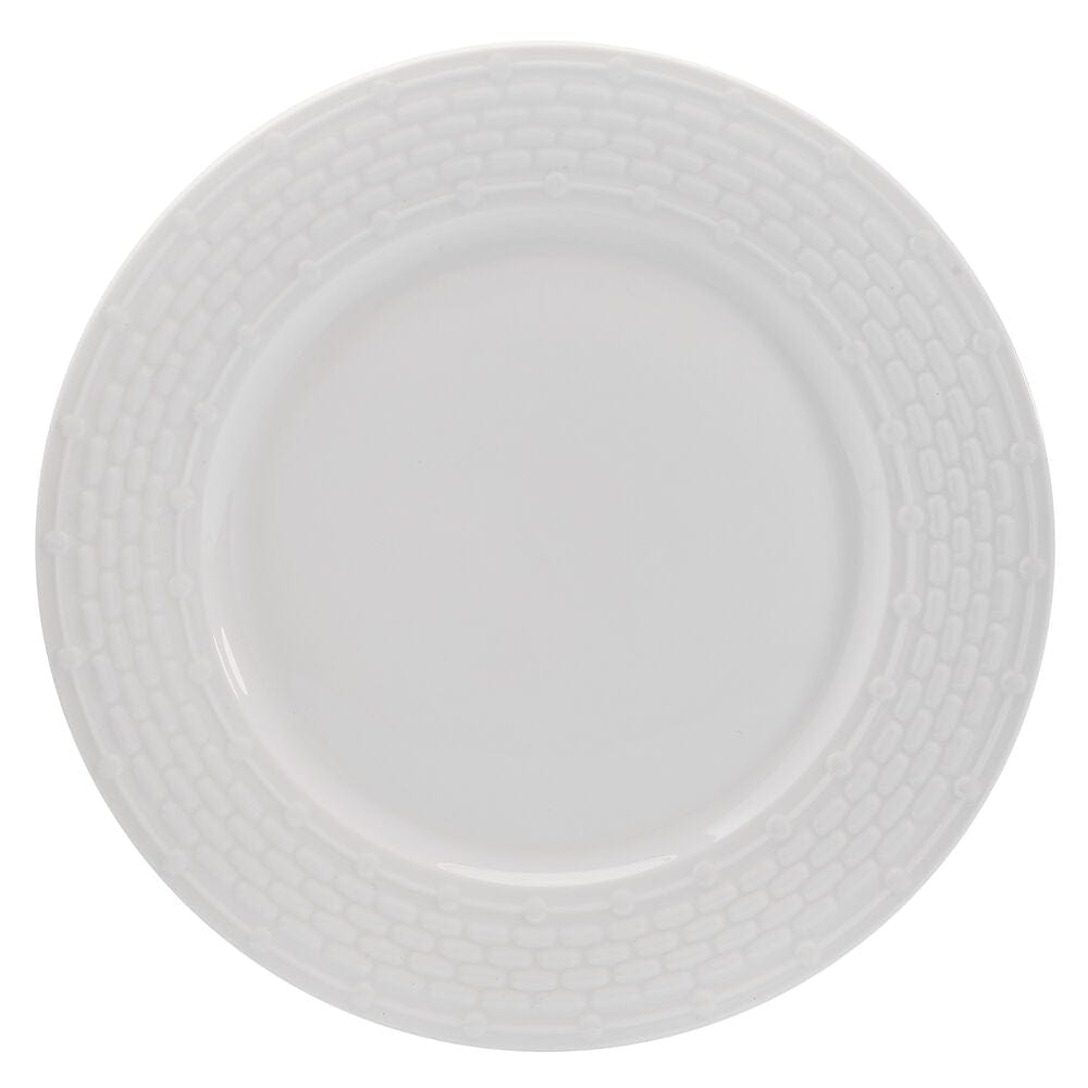 Close-up of embossed basket weave texture and beaded rim on white porcelain salad plate