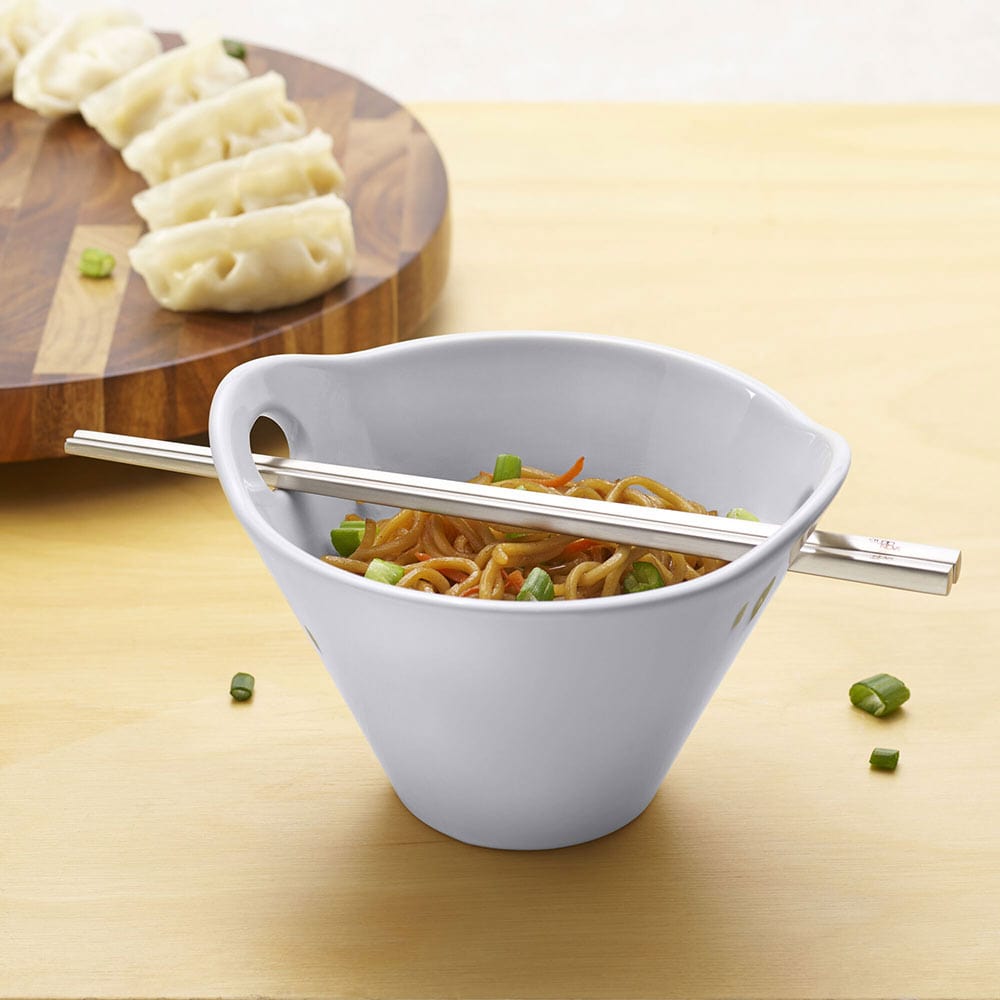 Studio Nova noodle bowl set showcasing contemporary angles and chopsticks for Asian dishes.