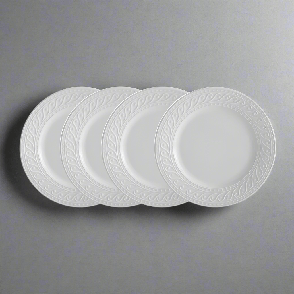 Elegant porcelain salad plate on a dining table, perfect for serving salads and snacks.