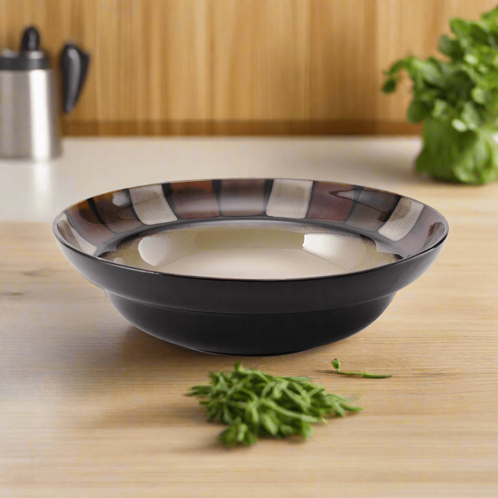 Close-up view of the handmade reactive glaze ceramic bowl showcasing its unique color variations.