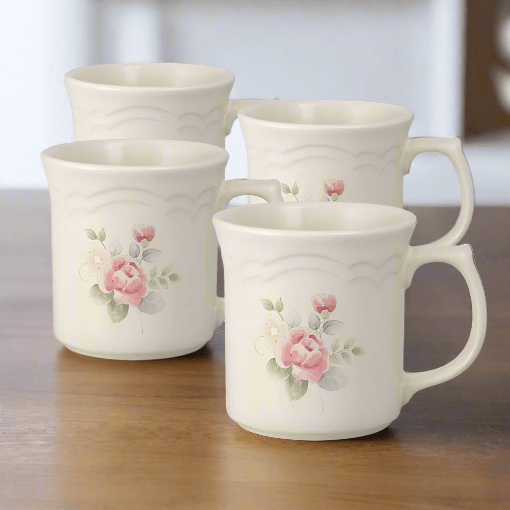 Close-up of Tea Rose set of 4 mugs showcasing floral design and size