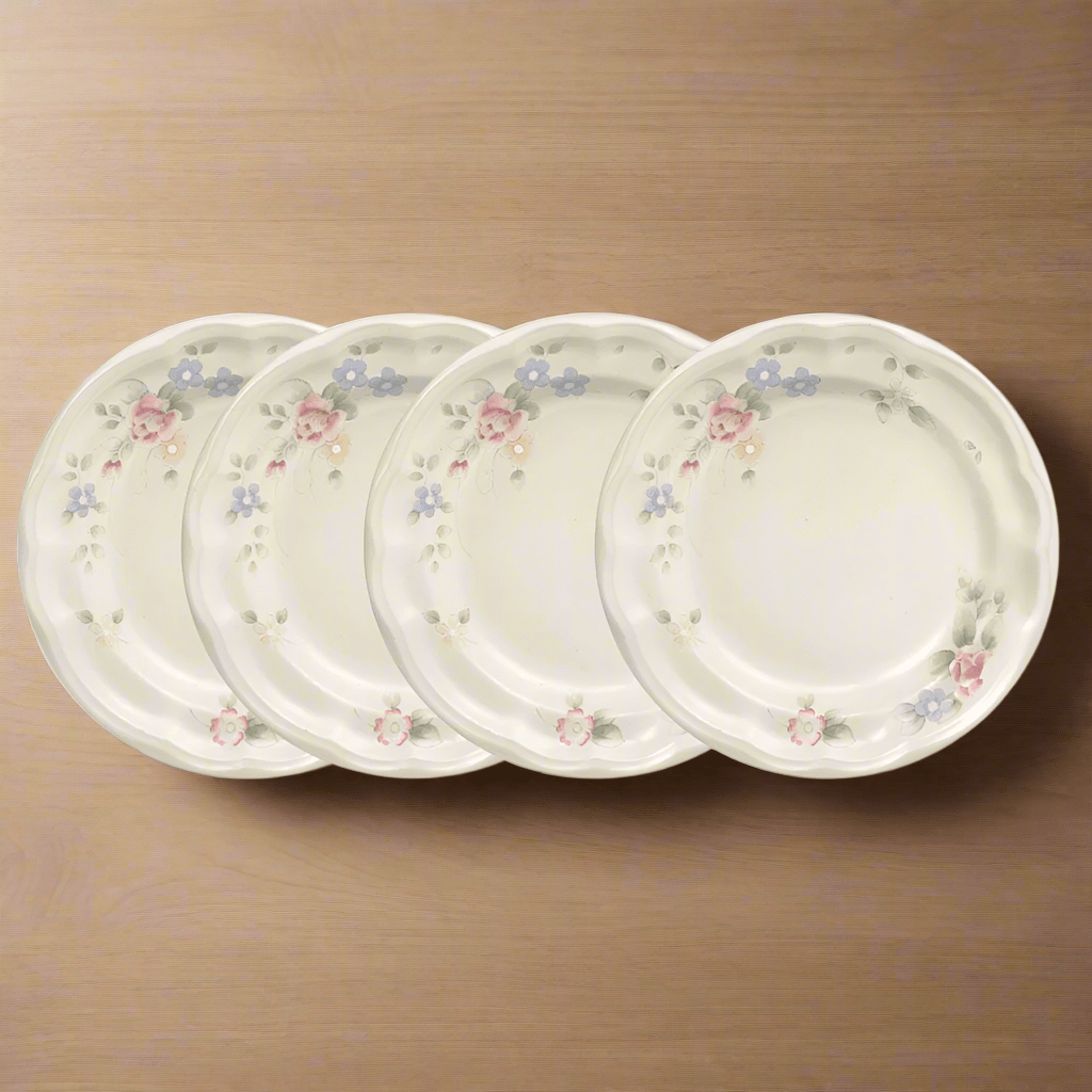 Elegant Tea Rose stoneware salad plate showcasing a floral design, perfect for serving salads.