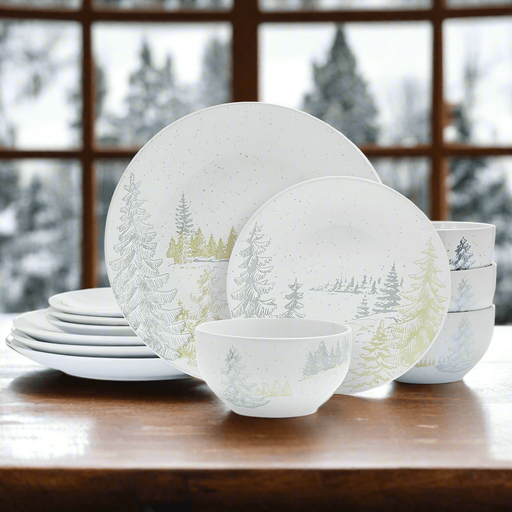 Rustic Retreat stoneware dinnerware set displayed on a wooden table, featuring earthy tones and nature-inspired designs.