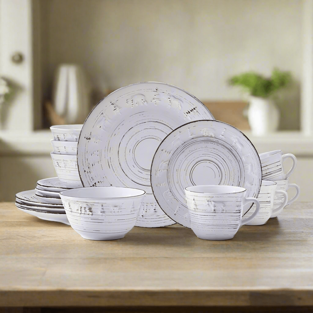 Rustic stoneware dinner plates with embossed pine trees and swirling textures