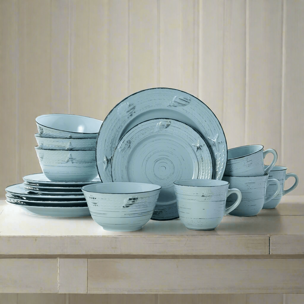 Close-up of Trellis Coastal teal dinnerware showing embossed seashell design