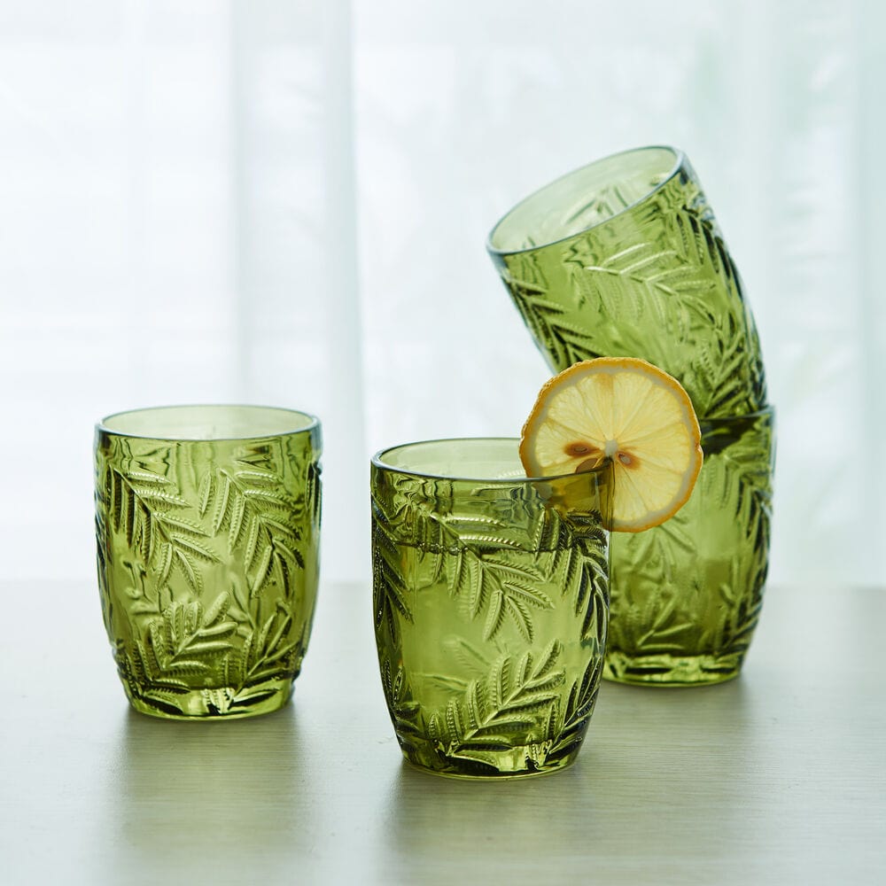 Close-up of Fitz and Floyd Villa Palm double old fashioned glass showing detailed tropical design