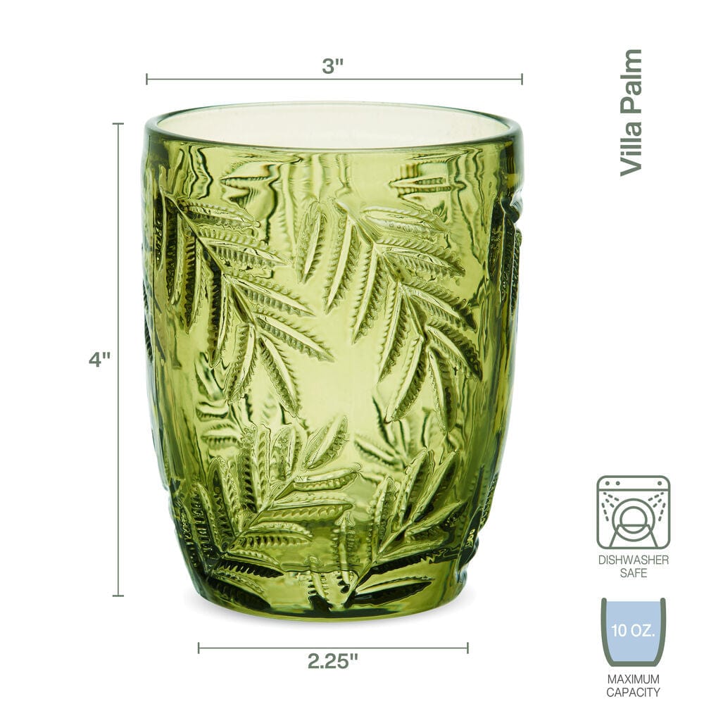 Fitz and Floyd glasses on a stylish home bar setup with tropical theme