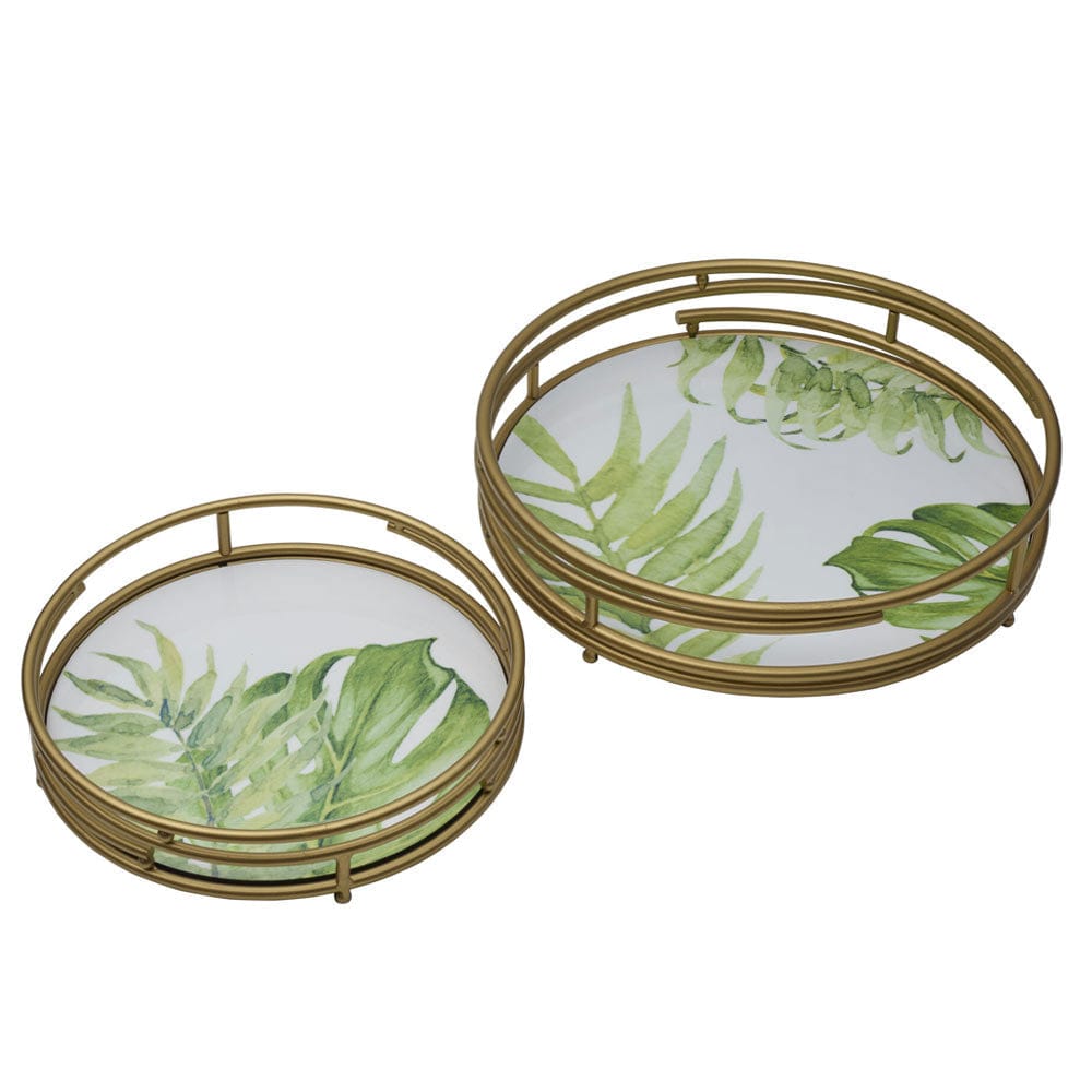 Lifestyle image of the Fitz and Floyd Villa Palm trays used as centerpiece decor in a beautifully arranged living room.