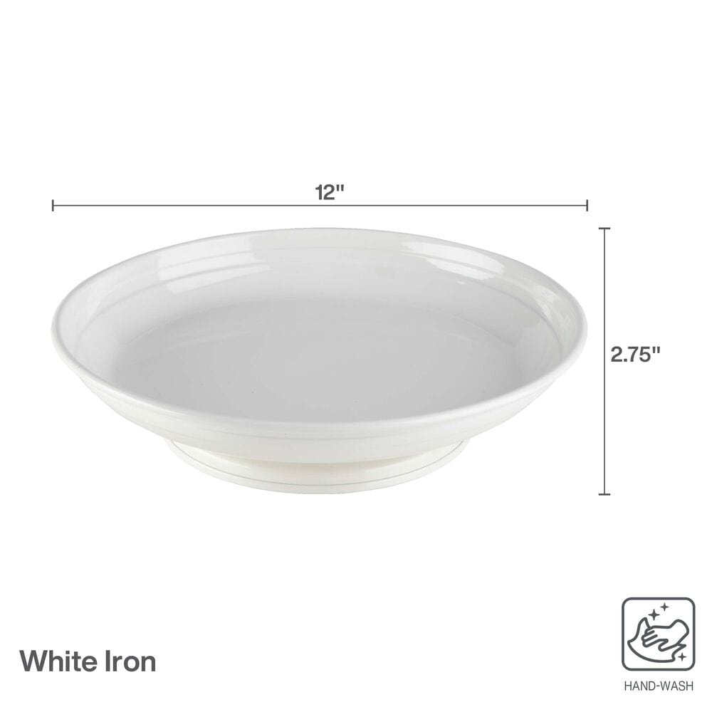Elegant white metal Lazy Susan used as a serving tray for dinner parties
