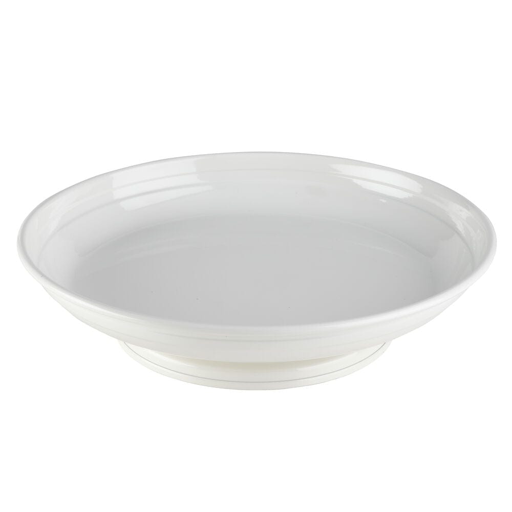 Elegant white metal Lazy Susan used as a serving tray for dinner parties