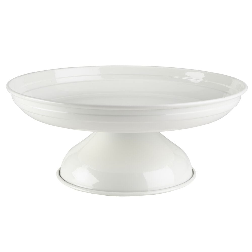 Large metal serving bowl filled with fresh salads at a party