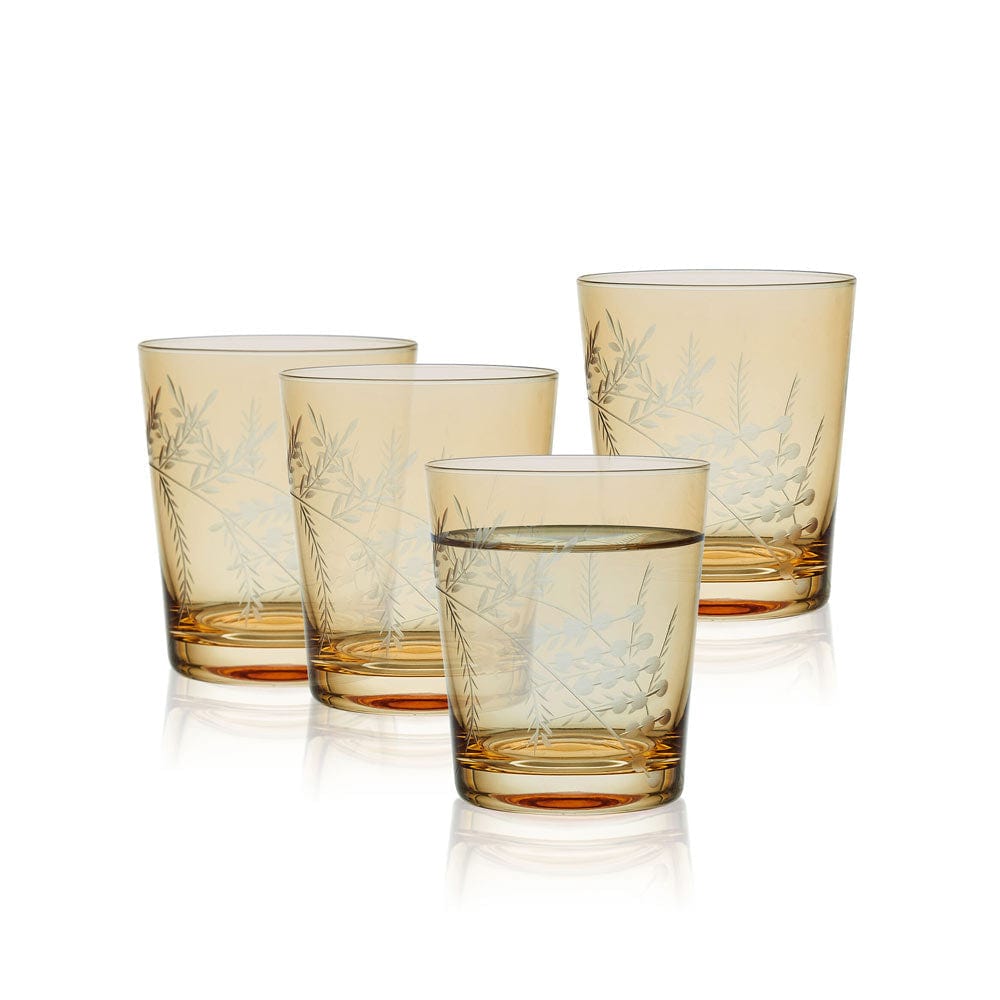 Close-up of Fitz and Floyd decorative drinkware set, showcasing intricate wildflower and gold detailing.