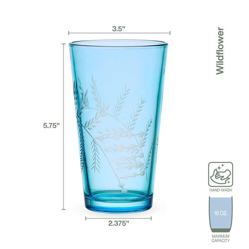 Close-up of whimsical blue highball glasses set against a rustic table setting, ideal for cocktails.